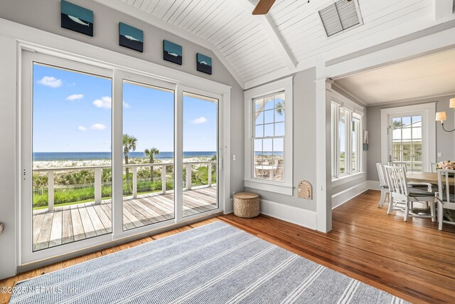102 Palm Pl, Neptune Beach, FL 32266 - sunroom / solarium featuring view of water and beach and plenty of natural light