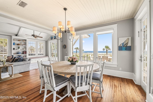 102 Palm Pl, Neptune Beach, FL 32266 - dining space featuring wooden ceiling, light wood-style floors, plenty of natural light, baseboards, and a chandelier