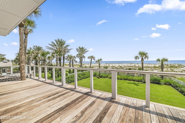 102 Palm Pl, Neptune Beach, FL 32266 - deck with view of water and beach and a lawn