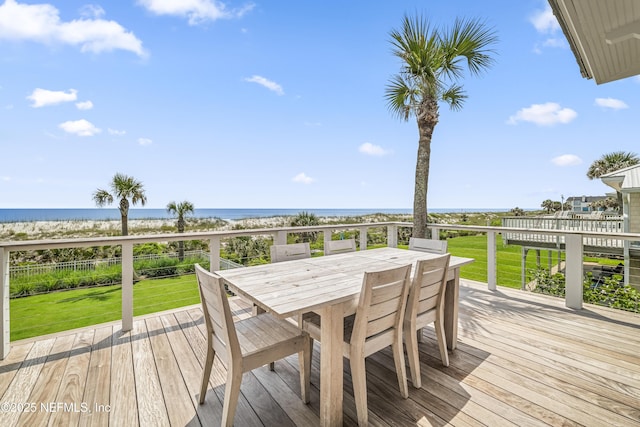 102 Palm Pl, Neptune Beach, FL 32266 - deck with a water view, a lawn, and outdoor dining area
