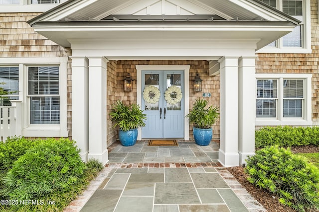 102 Palm Pl, Neptune Beach, FL 32266 - entrance to property featuring a porch and board and batten siding