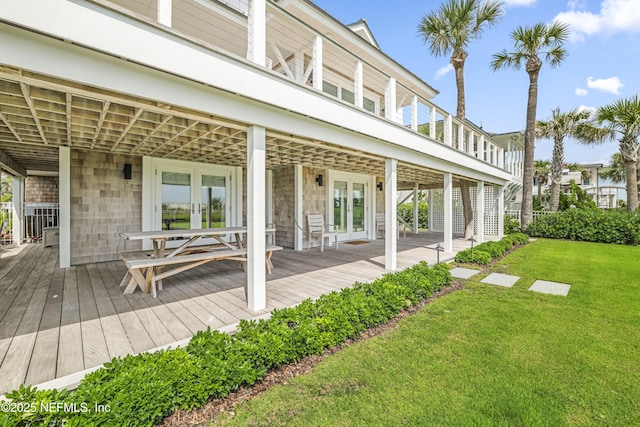 102 Palm Pl, Neptune Beach, FL 32266 - wooden deck with french doors and a yard