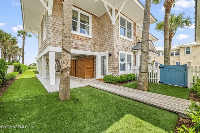 102 Palm Pl, Neptune Beach, FL 32266 - view of front facade with a gate