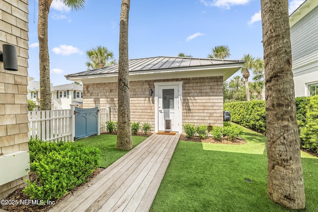 102 Palm Pl, Neptune Beach, FL 32266 - view of front of house featuring a standing seam roof and metal roof
