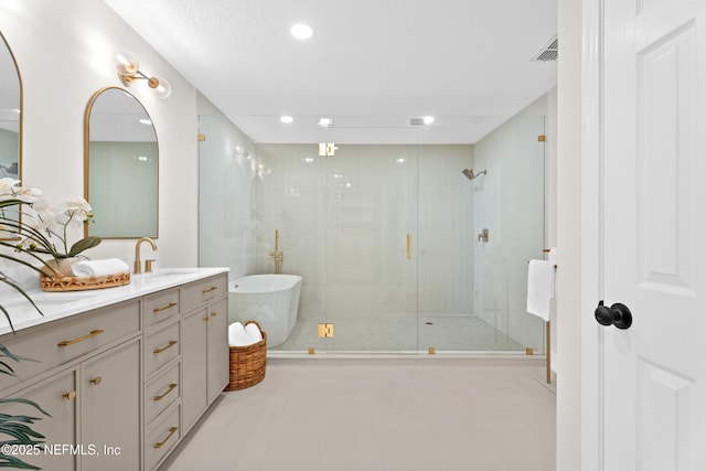 1008 Durbin Parke Dr, Saint Johns, FL 32259 - full bath with a freestanding tub, vanity, a shower stall, and recessed lighting