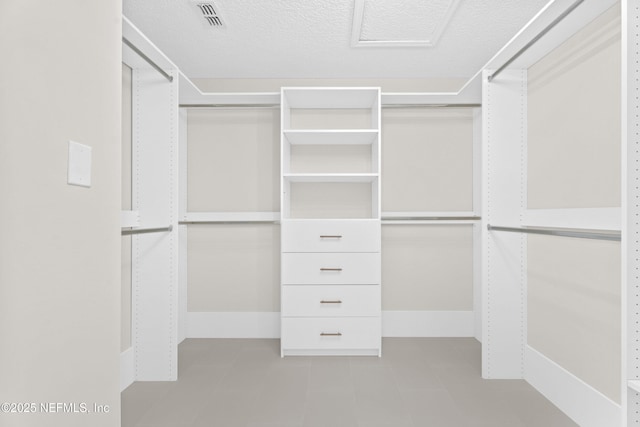 1008 Durbin Parke Dr, Saint Johns, FL 32259 - walk in closet with tile patterned flooring
