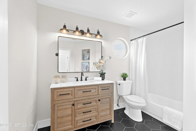 1008 Durbin Parke Dr, Saint Johns, FL 32259 - bathroom featuring vanity, toilet, tile patterned floors, shower / bath combo, and baseboards