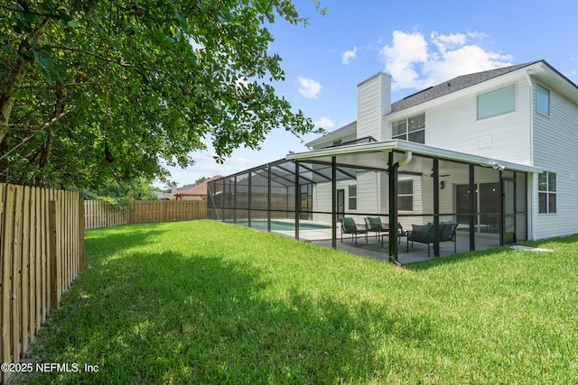 1008 Durbin Parke Dr, Saint Johns, FL 32259 - back of house with a chimney, a patio, and glass enclosure