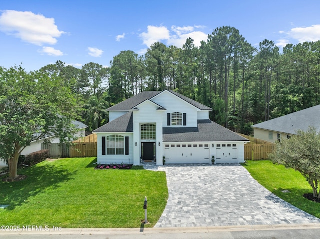 1008 Durbin Parke Dr, Saint Johns, FL 32259 - traditional-style home with a shingled roof, decorative driveway, and a garage