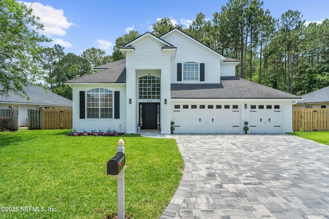 1008 Durbin Parke Dr, Saint Johns, FL 32259 - traditional-style home with decorative driveway, a shingled roof, and an attached garage