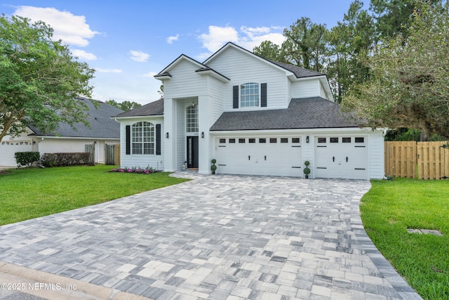 1008 Durbin Parke Dr, Saint Johns, FL 32259 - traditional-style home with decorative driveway, roof with shingles, and an attached garage