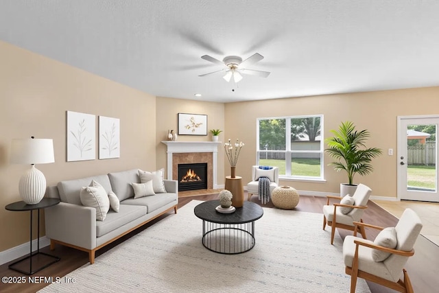 1147 Hyacinth St, Saint Augustine, FL 32092 - living area featuring ceiling fan, healthy amount of natural light, a fireplace, and baseboards