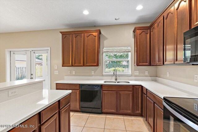 1147 Hyacinth St, Saint Augustine, FL 32092 - kitchen featuring black appliances, a sink, plenty of natural light, light countertops, and recessed lighting