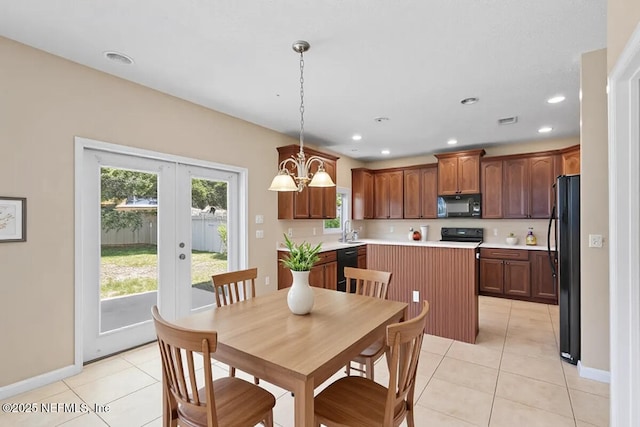 1147 Hyacinth St, Saint Augustine, FL 32092 - dining area with light tile patterned floors, baseboards, french doors, and recessed lighting