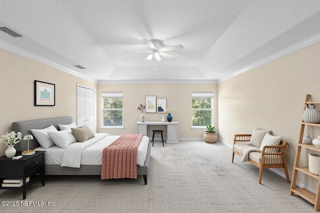 1147 Hyacinth St, Saint Augustine, FL 32092 - bedroom featuring a tray ceiling, carpet, a textured ceiling, a closet, and baseboards