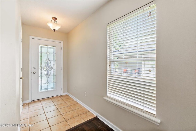 4952 Cypress Links Blvd, Elkton, FL 32033 - foyer with baseboards and light tile patterned floors