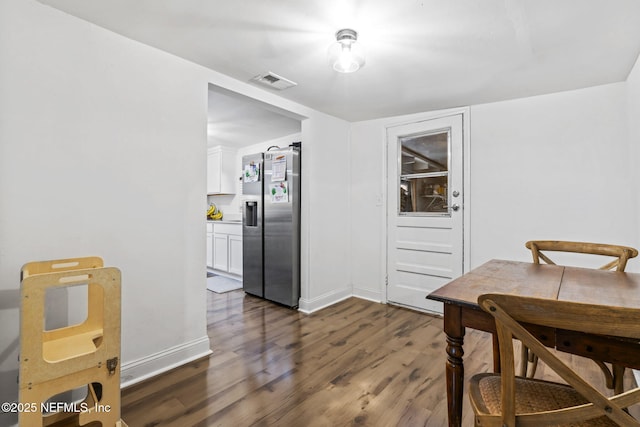 9160 Wild Rd, Jacksonville, FL 32220 - dining room featuring dark wood finished floors and baseboards