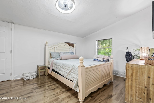 9160 Wild Rd, Jacksonville, FL 32220 - bedroom featuring vaulted ceiling, wood finished floors, and baseboards