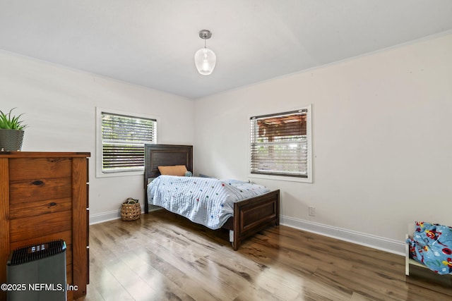 9160 Wild Rd, Jacksonville, FL 32220 - bedroom with wood finished floors and baseboards