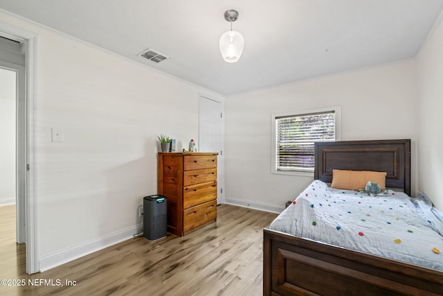 9160 Wild Rd, Jacksonville, FL 32220 - bedroom with light wood finished floors and baseboards