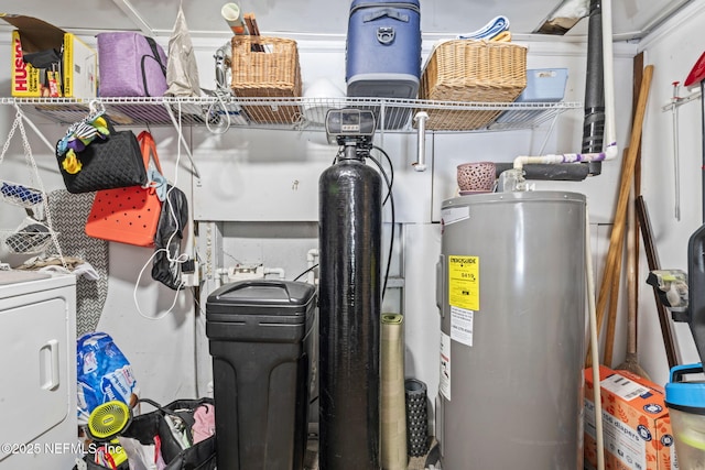 9160 Wild Rd, Jacksonville, FL 32220 - utility room featuring water heater and washer / clothes dryer