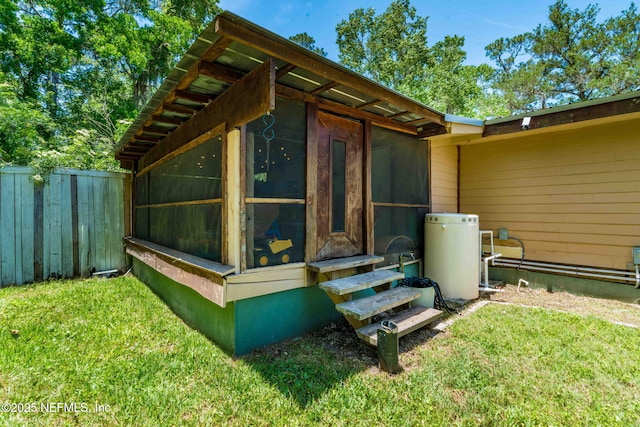 9160 Wild Rd, Jacksonville, FL 32220 - view of side of home featuring a sunroom