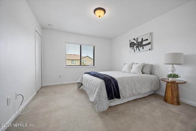 650 Drake Bay Ter, Saint Augustine, FL 32084 - carpeted bedroom featuring baseboards and a textured ceiling