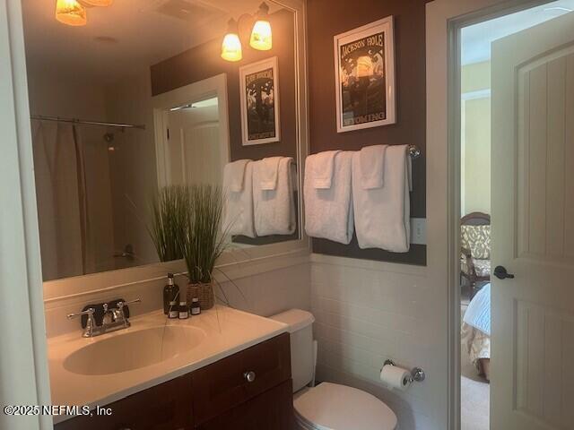 955 Registry Blvd Unit 229, Saint Augustine, FL 32092 - full bath featuring vanity and curtained shower