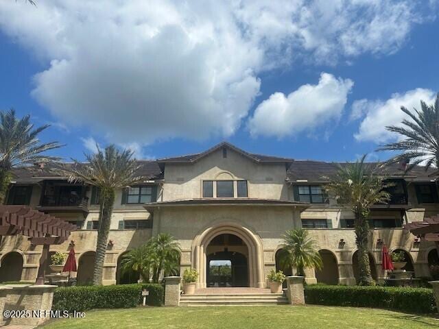 955 Registry Blvd Unit 229, Saint Augustine, FL 32092 - view of front of home featuring a front lawn and stucco siding
