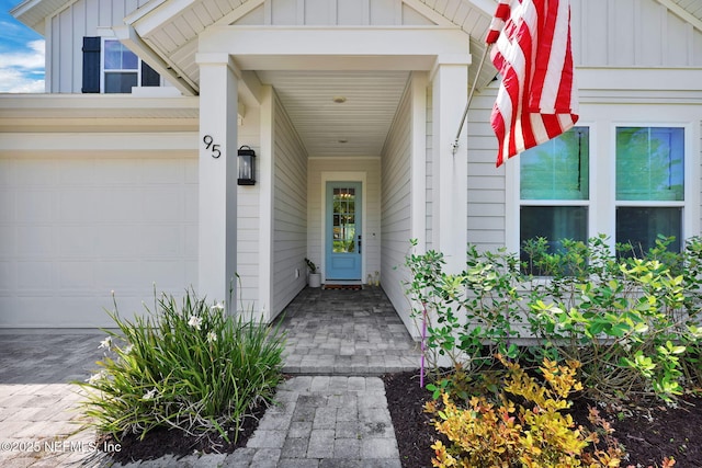 95 Farmers Branch Ave, Ponte Vedra, FL 32081 - doorway to property with board and batten siding and an attached garage