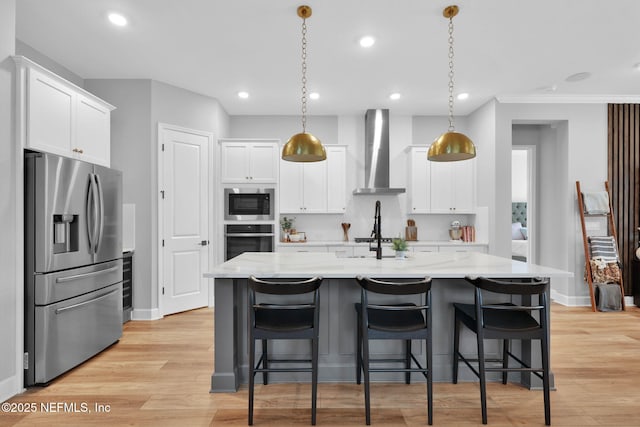 95 Farmers Branch Ave, Ponte Vedra, FL 32081 - kitchen with appliances with stainless steel finishes, wall chimney exhaust hood, white cabinetry, baseboards, and recessed lighting