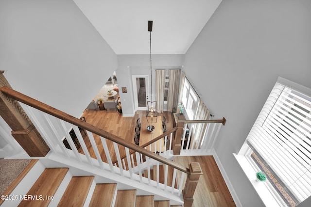 95 Farmers Branch Ave, Ponte Vedra, FL 32081 - stairway with wood finished floors, plenty of natural light, a high ceiling, and baseboards