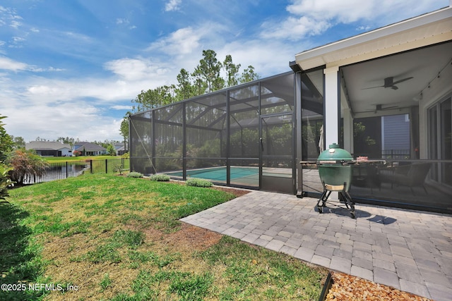 95 Farmers Branch Ave, Ponte Vedra, FL 32081 - view of yard featuring ceiling fan, a patio area, an outdoor pool, a lanai, and a water view