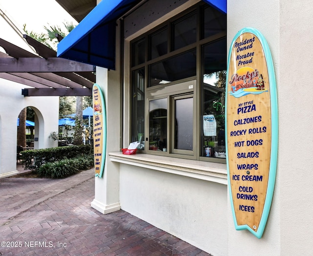 95 Farmers Branch Ave, Ponte Vedra, FL 32081 - doorway to property with stucco siding