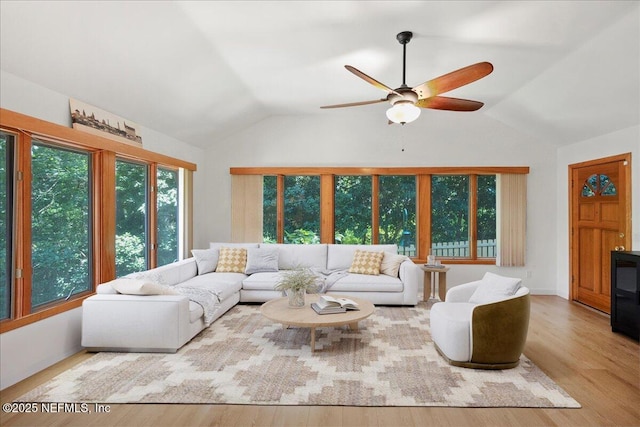 404 Camelia Trl, Saint Augustine, FL 32086 - living area featuring vaulted ceiling, wood finished floors, and ceiling fan