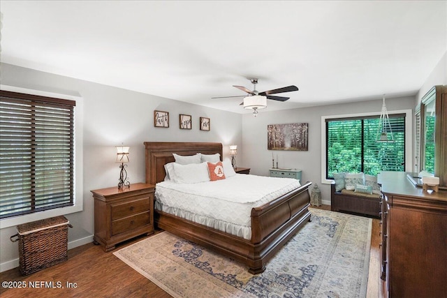 404 Camelia Trl, Saint Augustine, FL 32086 - bedroom featuring baseboards, wood finished floors, and ceiling fan