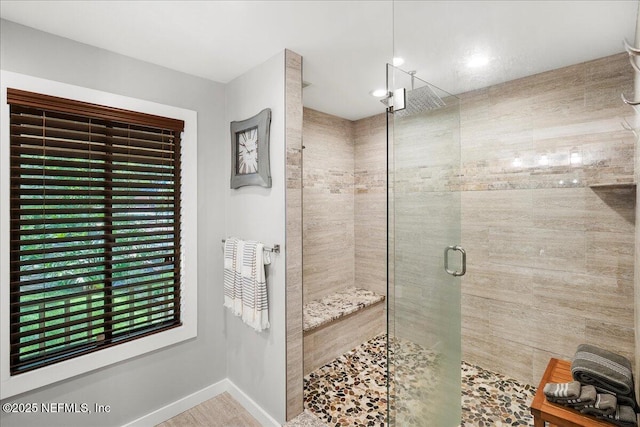 404 Camelia Trl, Saint Augustine, FL 32086 - bathroom featuring a shower stall and baseboards