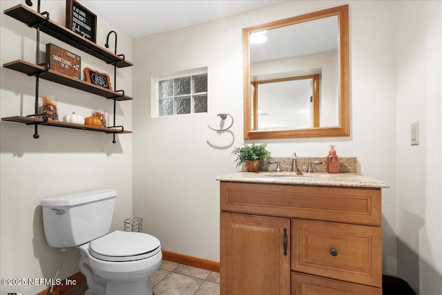 404 Camelia Trl, Saint Augustine, FL 32086 - half bath with toilet, vanity, baseboards, and tile patterned floors