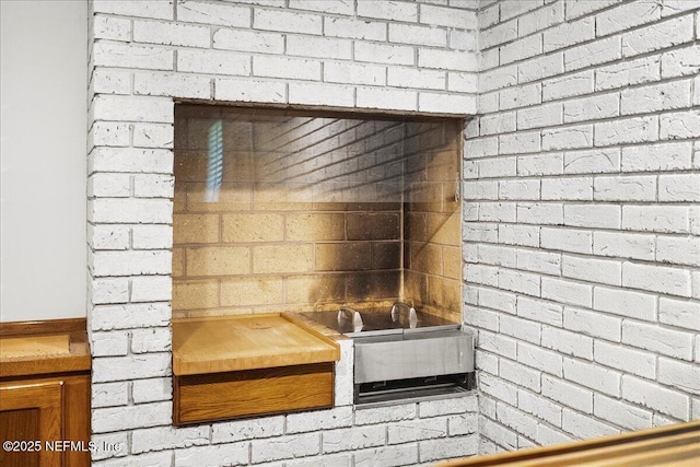 404 Camelia Trl, Saint Augustine, FL 32086 - kitchen view of brick wall