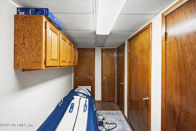 404 Camelia Trl, Saint Augustine, FL 32086 - hallway featuring a drop ceiling and wood finished floors