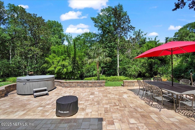 404 Camelia Trl, Saint Augustine, FL 32086 - view of patio with a hot tub and outdoor dining space