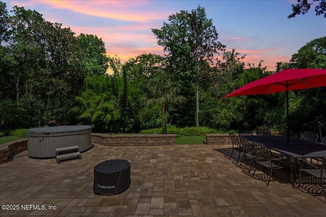 404 Camelia Trl, Saint Augustine, FL 32086 - view of patio / terrace featuring a hot tub and outdoor dining area