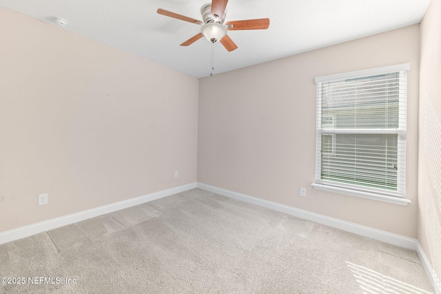 305 Green Turtle Ln, Saint Augustine, FL 32086 - spare room with carpet flooring, baseboards, a ceiling fan, and a smoke detector