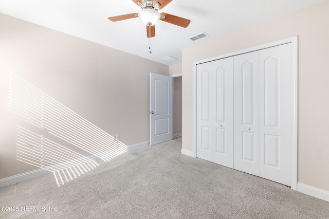 305 Green Turtle Ln, Saint Augustine, FL 32086 - unfurnished bedroom featuring carpet, baseboards, a closet, and ceiling fan