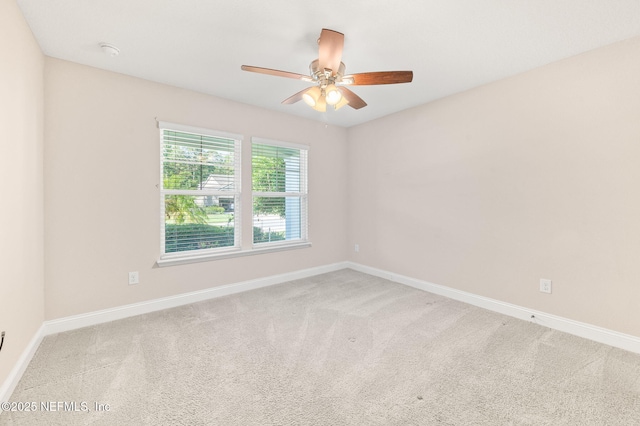 305 Green Turtle Ln, Saint Augustine, FL 32086 - spare room with a ceiling fan, baseboards, carpet flooring, and a smoke detector