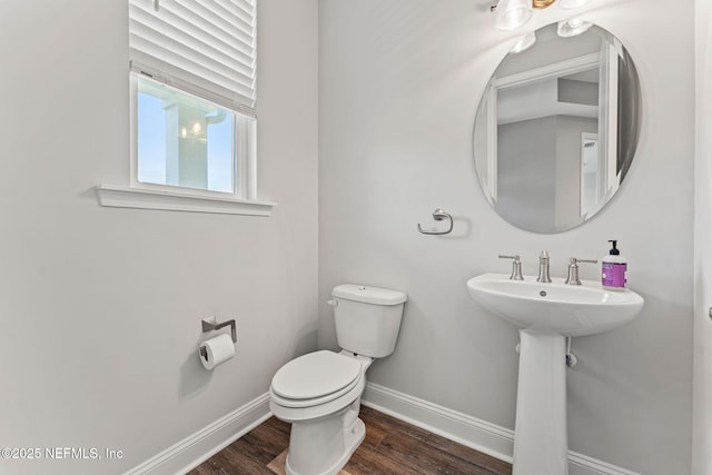 68 Cabana Dr, Ponte Vedra, FL 32081 - bathroom with baseboards, toilet, and wood finished floors