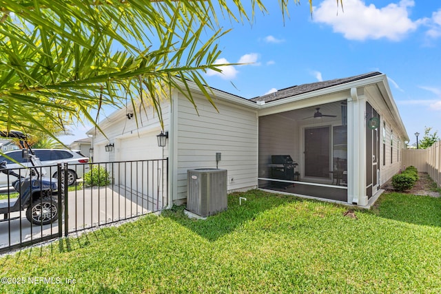 68 Cabana Dr, Ponte Vedra, FL 32081 - view of property exterior with cooling unit, a sunroom, and a garage