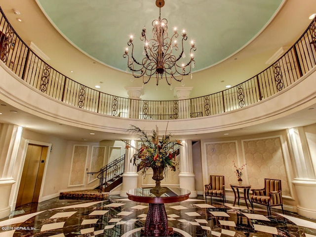 400 E Bay St Unit 1010, Jacksonville, FL 32202 - community lobby featuring a high ceiling, stairs, and recessed lighting