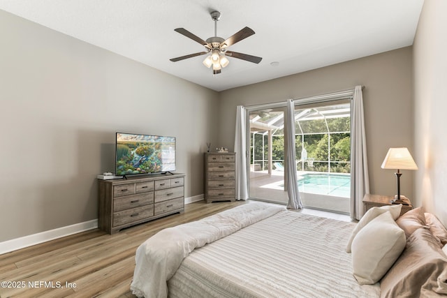 3820 Danforth Dr W, Jacksonville, FL 32224 - bedroom featuring access to exterior, light wood-style flooring, baseboards, and a ceiling fan