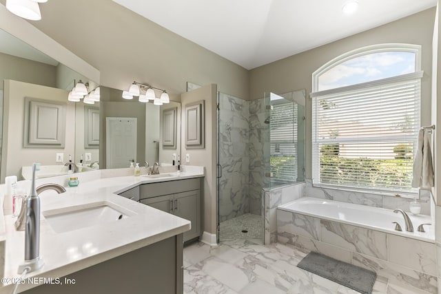 3820 Danforth Dr W, Jacksonville, FL 32224 - bathroom featuring a garden tub, marble look tiles, a marble finish shower, vanity, and recessed lighting